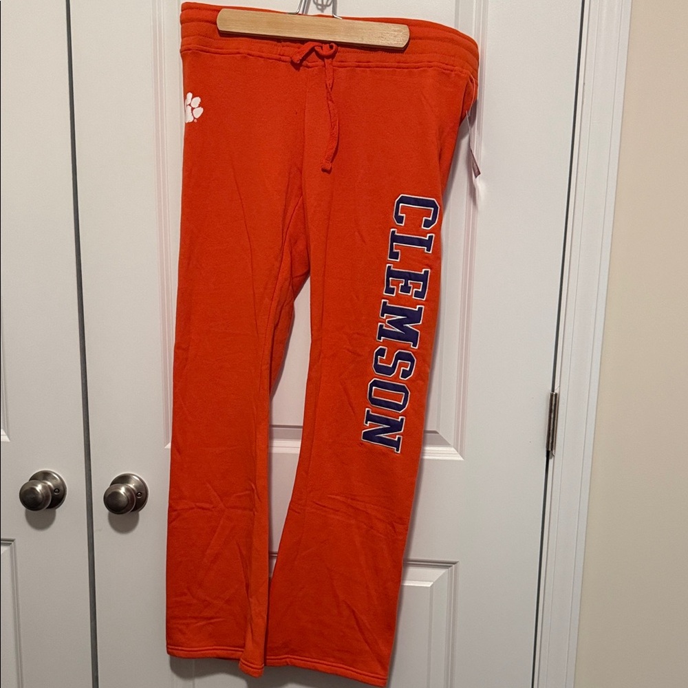 Champion Women’s Orange Sweatpants with Blue Lettering